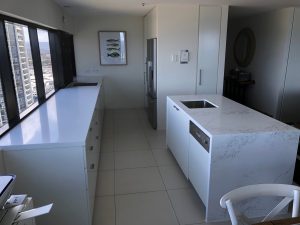 Using Caesarstone's NEW Empira White on the 40mm Island with an undermount sink, backbench in Intense white to leave the Island as the focus